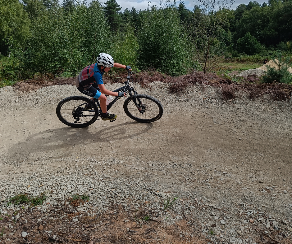 Rider practicing their technique on a berm.